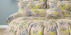 Suggestion


Floral patterned bedding set on a bed in a room with a dark wall and wooden bench
